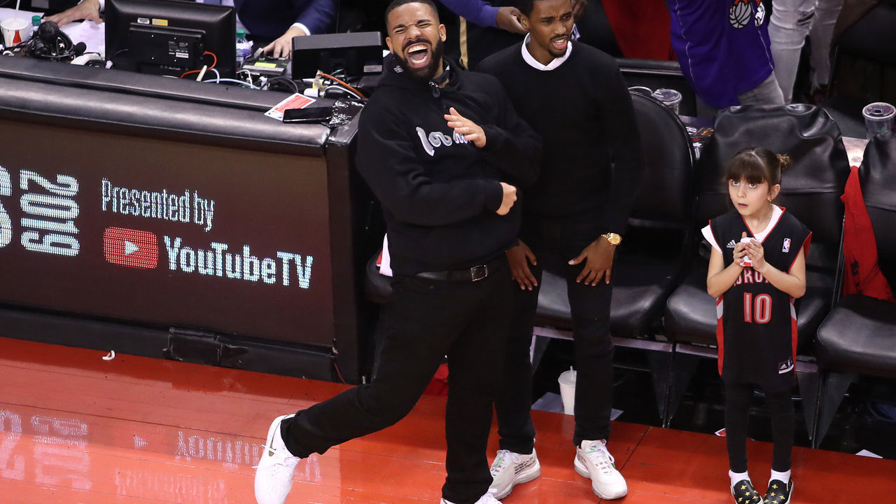 TORONTO, ONTARIO - MAY 25: Rapper Drake reacts after the Toronto Raptors defeated the Milwaukee Bucks 100-94 in game six of the NBA Eastern Conference Finals to advance to the 2019 NBA Finals at Scotiabank Arena on May 25, 2019 in Toronto, Canada.