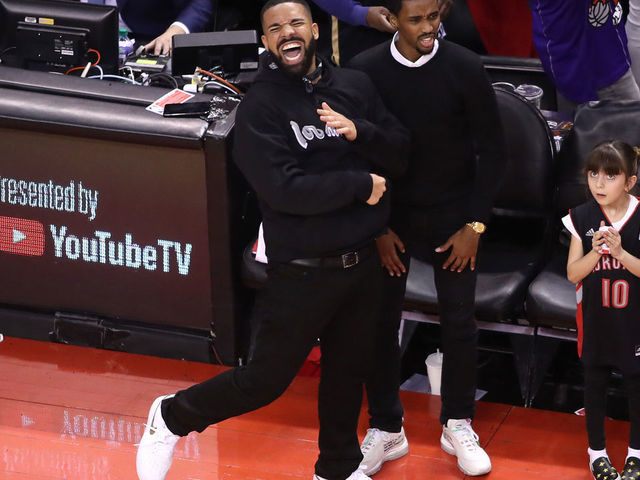 TORONTO, ONTARIO - MAY 25: Rapper Drake reacts after the Toronto Raptors defeated the Milwaukee Bucks 100-94 in game six of the NBA Eastern Conference Finals to advance to the 2019 NBA Finals at Scotiabank Arena on May 25, 2019 in Toronto, Canada.