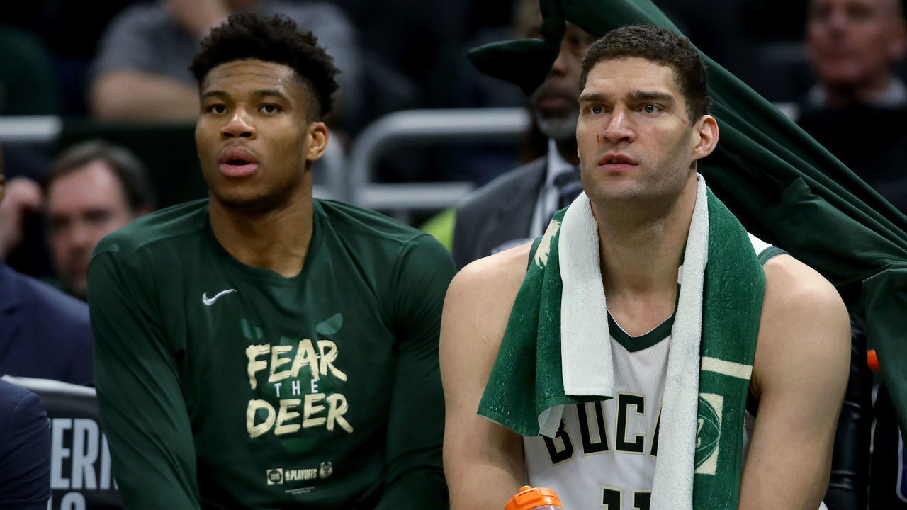 MILWAUKEE, WISCONSIN - MAY 17: Giannis Antetokounmpo #34 and Brook Lopez #11 of the Milwaukee Bucks look on in the fourth quarter against the Toronto Raptors during Game Two of the Eastern Conference Finals of the 2019 NBA Playoffs at the Fiserv Forum on May 17, 2019 in Milwaukee, Wisconsin.