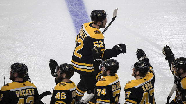 BOSTON, MA - MAY 27: Bruins Sean Kuraly celebrates third period goal with the bench to give Bruins 3-2 lead. The Boston Bruins host the St. Louis Blues in Game One of the 2019 Stanley Cup Finals at TD Garden on May 27, 2019.
