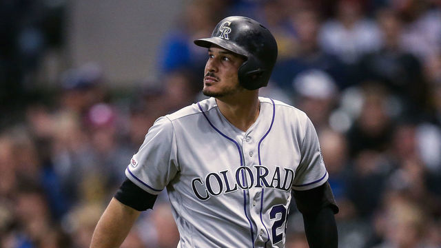 MILWAUKEE, WISCONSIN - APRIL 29: Nolan Arenado #28 of the Colorado Rockies walks back to the dugout after striking out in the eighth inning against the Milwaukee Brewers at Miller Park on April 29, 2019 in Milwaukee, Wisconsin.