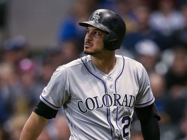MILWAUKEE, WISCONSIN - APRIL 29: Nolan Arenado #28 of the Colorado Rockies walks back to the dugout after striking out in the eighth inning against the Milwaukee Brewers at Miller Park on April 29, 2019 in Milwaukee, Wisconsin.