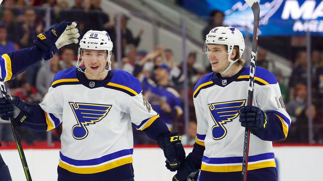 RALEIGH, NC - MARCH 1: Colton Parayko #55, Vince Dunn #29, and Robert Thomas #18 of the St. Louis Blues celebrate a goal by Dunn against the Carolina Hurricanes during an NHL game on MARCH 1, 2019 at PNC Arena in Raleigh, North Carolina.