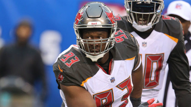 EAST RUTHERFORD, NJ - NOVEMBER 18: Defensive Tackle Gerald McCoy #93 of the Tampa Bay Buccaneers sacks Quarterback Eli Manning #10 of the New York Giants at MetLife Stadium on November 18, 2018 in East Rutherford, New Jersey. The New York Giants won 38-35.