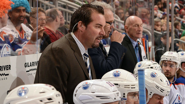 GLENDALE, AZ - DECEMBER 16: Head coach Todd Nelson and general manager Craig MacTavish of the Edmonton Oilers watch play from the bench against the Arizona Coyotes at Gila River Arena on December 16, 2014 in Glendale, Arizona.