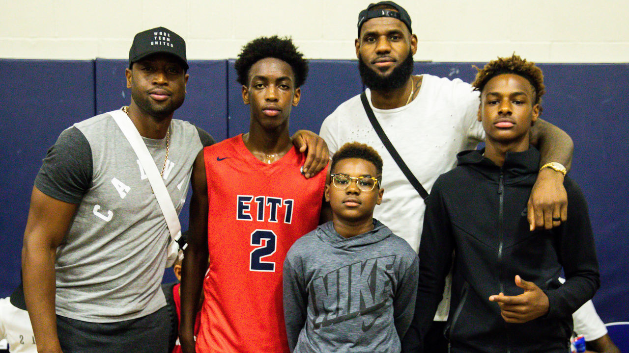 LAS VEGAS, NV - JULY 26: (L-R) Dwyane Wade, Zaire Wade, Bryce Maximus James, LeBron James Sr and LeBron James Jr. pose together after Zaire Wade’s AAU game at the Fab 48 tournament at Bishop Gorman High School on July 26, 2018 in Las Vegas, Nevada.