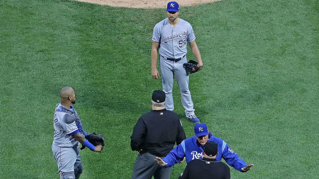 CHICAGO, ILLINOIS - MAY 29: Manager Ned Yost #3 of the Kansas City Royals argues with home plate umpire Mark Carlson #6 (center) after Carlson threw out starting pitcher Glenn Sparkman #57 (top) who hit Tim Anderson #7 of the Chicago White Sox (bottom) with a pitch in the 2nd inning at Guaranteed Rate Field on May 29, 2019 in Chicago, Illinois.