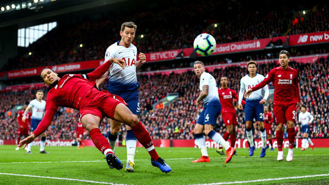 LIVERPOOL, ENGLAND - MARCH 31: Virgil van Dijk of Liverpool and Jan Vertonghen of Tottenham Hotspur during the Premier League match between Liverpool FC and Tottenham Hotspur at Anfield on March 31, 2019 in Liverpool, United Kingdom.