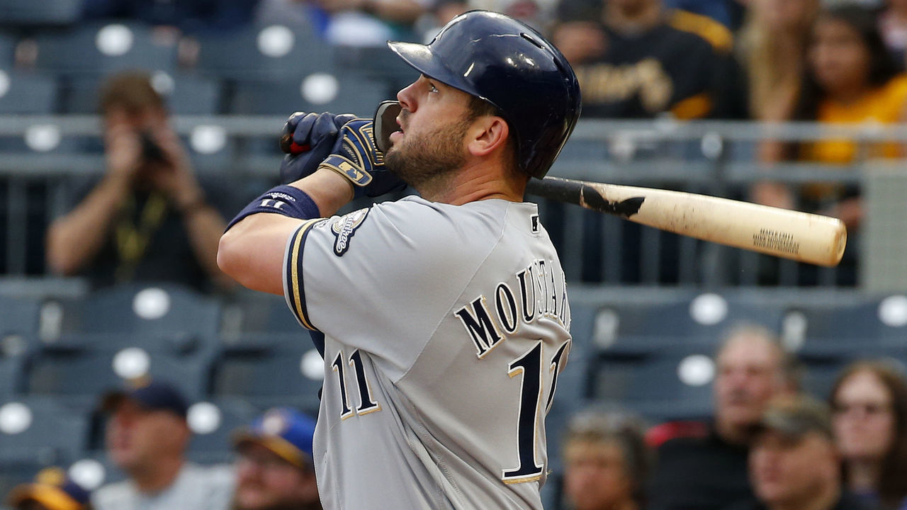PITTSBURGH, PA - MAY 30: Mike Moustakas #11 of the Milwaukee Brewers hits a two run home run in the first inning against the Pittsburgh Pirates at PNC Park on May 30, 2019 in Pittsburgh, Pennsylvania.