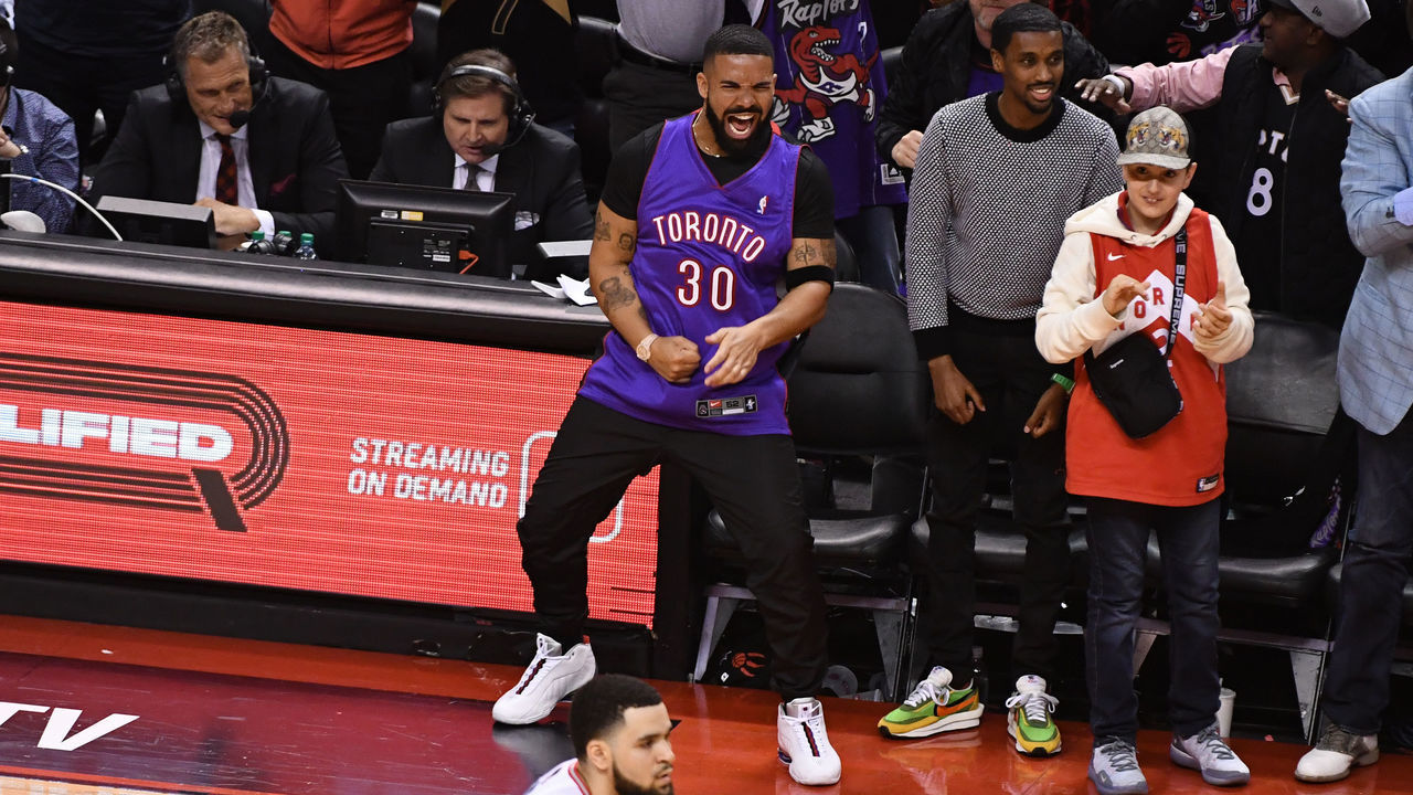 TORONTO, CANADA - MAY 30: Rapper, Drake celebrates during Game One of the NBA Finals between the Golden State Warriors and the Toronto Raptors on May 30, 2019 at Scotiabank Arena in Toronto, Ontario, Canada. NOTE TO USER: User expressly acknowledges and agrees that, by downloading and/or using this photograph, user is consenting to the terms and conditions of the Getty Images License Agreement. Mandatory Copyright Notice: Copyright 2019 NBAE