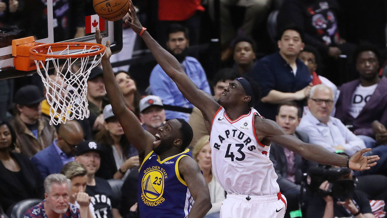 TORONTO, ON- MAY 30 - Toronto Raptors forward Pascal Siakam (43) blocks a shot by Golden State Warriors forward Draymond Green (23) as the Toronto Raptors beat the Golden State Warriors in game One of the NBA Finals in Toronto. May 30, 2019. (Steve Russell/Toronto Star via Getty Images)