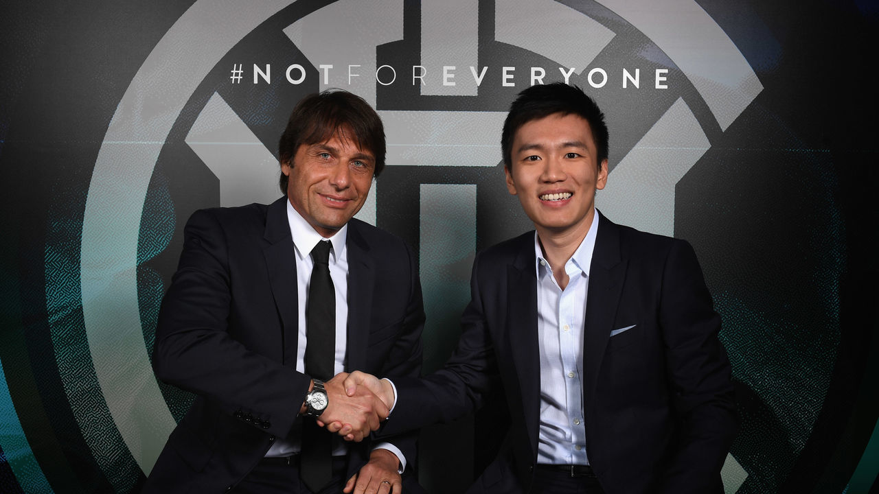 COMO, ITALY - MAY 31: President of FC Internazionale Steven Zhang shakes hands with new head coach Antonio Conte at Appiano Gentile on May 31, 2019 in Como, Italy.