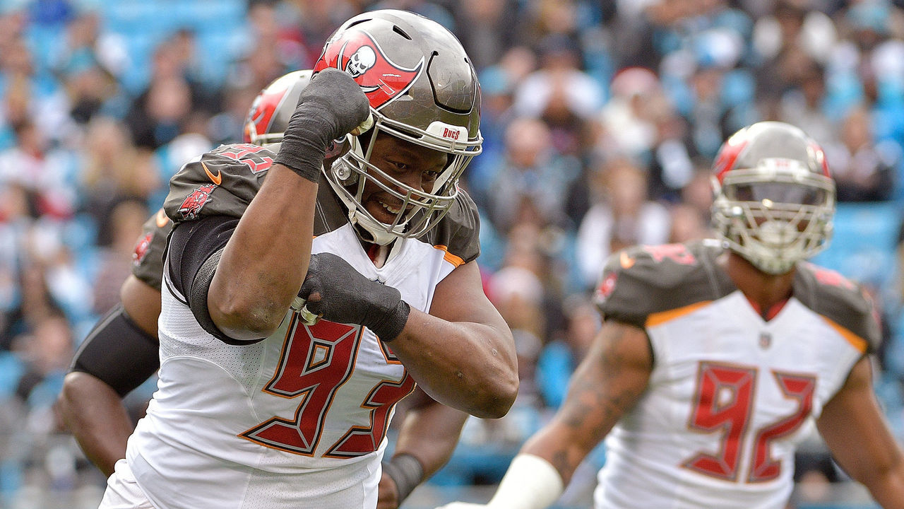 CHARLOTTE, NC - DECEMBER 24: Gerald McCoy #93 of the Tampa Bay Buccaneers reacts after scaking Cam Newton #1 of the Carolina Panthers during their game at Bank of America Stadium on December 24, 2017 in Charlotte, North Carolina.