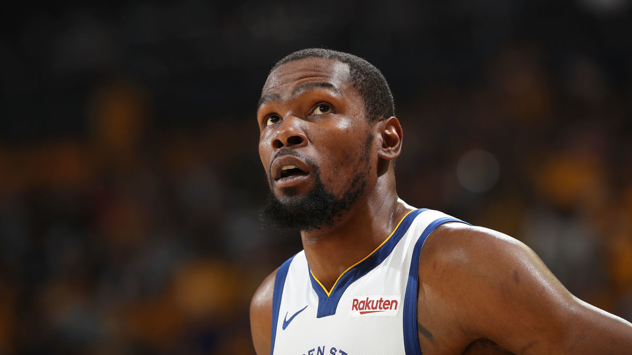 OAKLAND, CA - MAY 8: Kevin Durant #35 of the Golden State Warriors looks on against the Houston Rockets during Game Five of the Western Conference Semifinals of the 2019 NBA Playoffs on May 8, 2019 at ORACLE Arena in Oakland, California. NOTE TO USER: User expressly acknowledges and agrees that, by downloading and/or using this photograph, user is consenting to the terms and conditions of Getty Images License Agreement. Mandatory Copyright Notice: Copyright 2019 NBAE