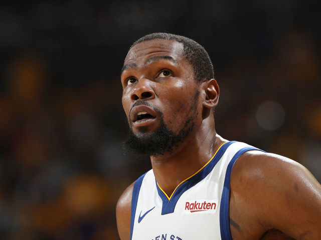 OAKLAND, CA - MAY 8: Kevin Durant #35 of the Golden State Warriors looks on against the Houston Rockets during Game Five of the Western Conference Semifinals of the 2019 NBA Playoffs on May 8, 2019 at ORACLE Arena in Oakland, California. NOTE TO USER: User expressly acknowledges and agrees that, by downloading and/or using this photograph, user is consenting to the terms and conditions of Getty Images License Agreement. Mandatory Copyright Notice: Copyright 2019 NBAE