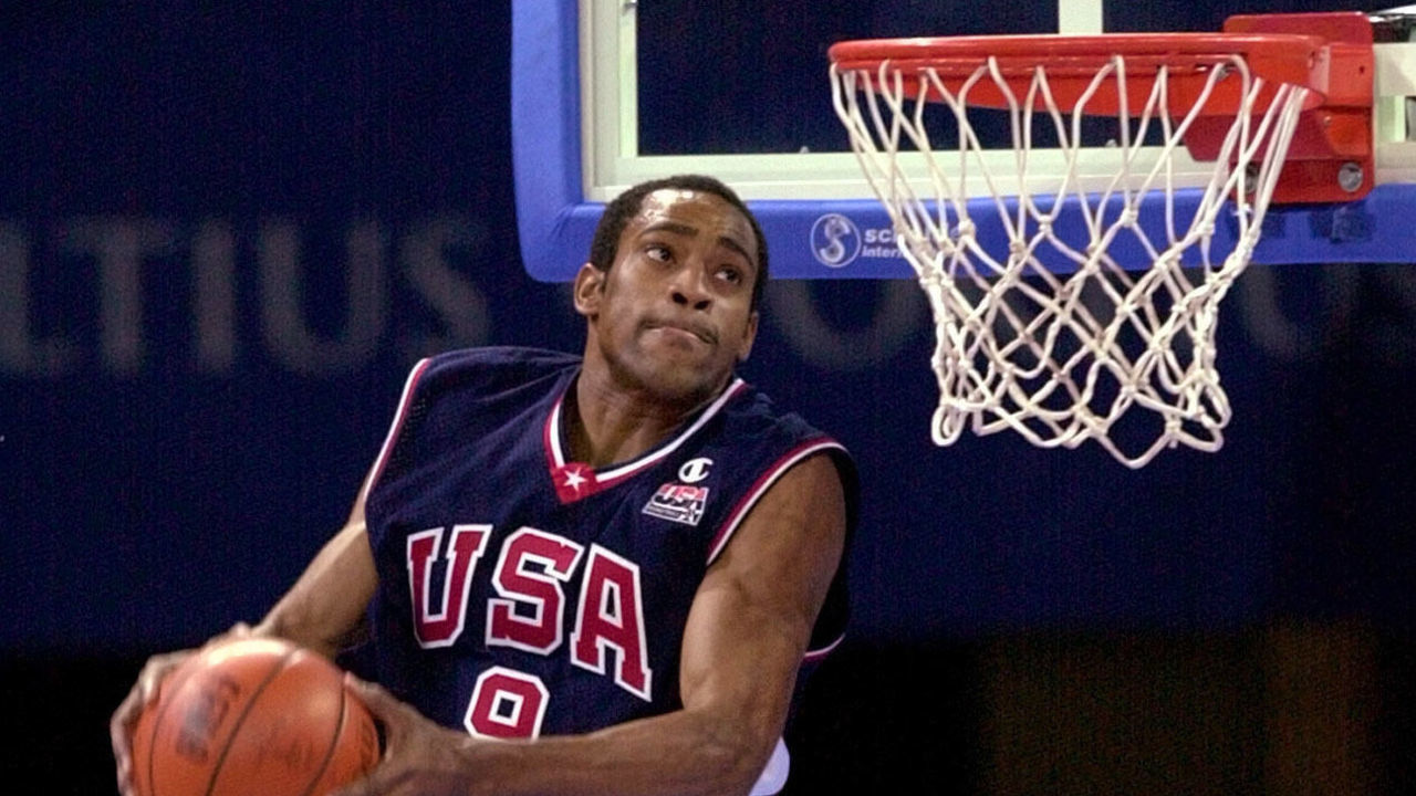 SYDNEY, AUSTRALIA - OCTOBER 1: Vince Carter of the United States soars in the air before dunking 01 October 2000 during the men's gold medal match in the Sydney 2000 Olympics at the SuperDome. Carter scored 13 points in the game to help the USA defeat France 85-75 for the gold medal. France takes home the silver medal and Lithuania the bronze.