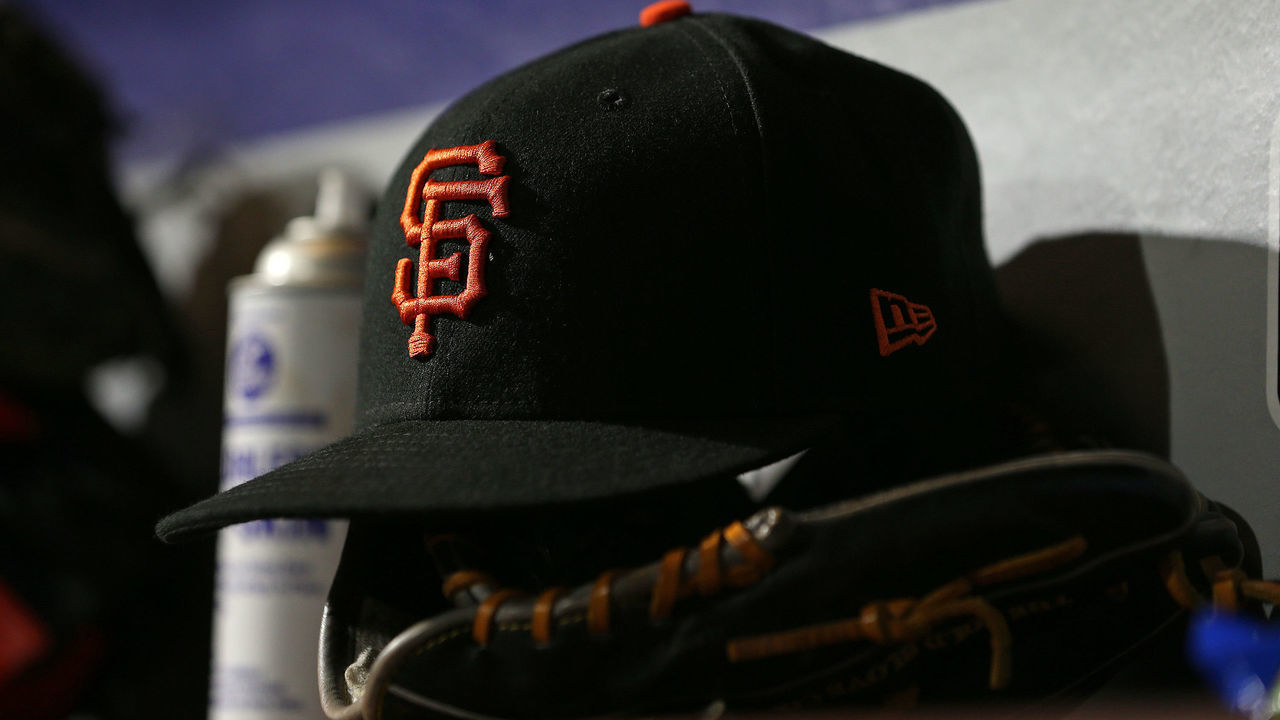 PHILADELPHIA, PA - MAY 08: A New Era cap of the San Francisco Giants sits in the dugout during a game against the Philadelphia Phillies at Citizens Bank Park on May 8, 2018 in Philadelphia, Pennsylvania. The Phillies defeated the Giants 4-2.