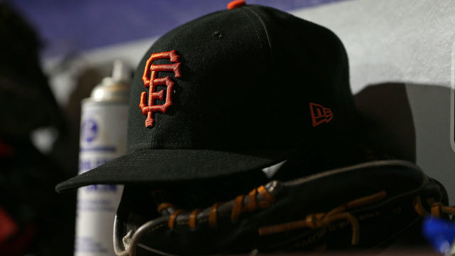 PHILADELPHIA, PA - MAY 08: A New Era cap of the San Francisco Giants sits in the dugout during a game against the Philadelphia Phillies at Citizens Bank Park on May 8, 2018 in Philadelphia, Pennsylvania. The Phillies defeated the Giants 4-2.