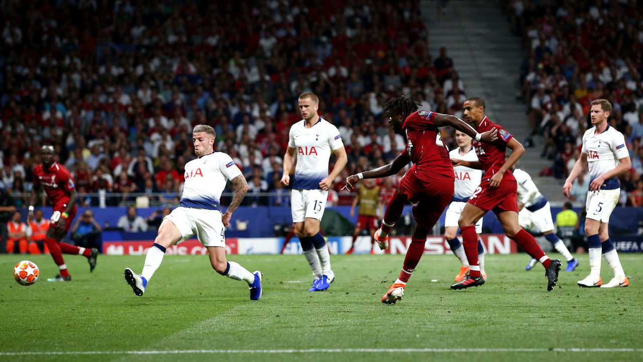 MADRID, SPAIN - JUNE 01: Divock Origi of Liverpool scores his sides second goal during the UEFA Champions League Final between Tottenham Hotspur and Liverpool at Estadio Wanda Metropolitano on June 01, 2019 in Madrid, Spain.