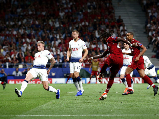 MADRID, SPAIN - JUNE 01: Divock Origi of Liverpool scores his sides second goal during the UEFA Champions League Final between Tottenham Hotspur and Liverpool at Estadio Wanda Metropolitano on June 01, 2019 in Madrid, Spain.