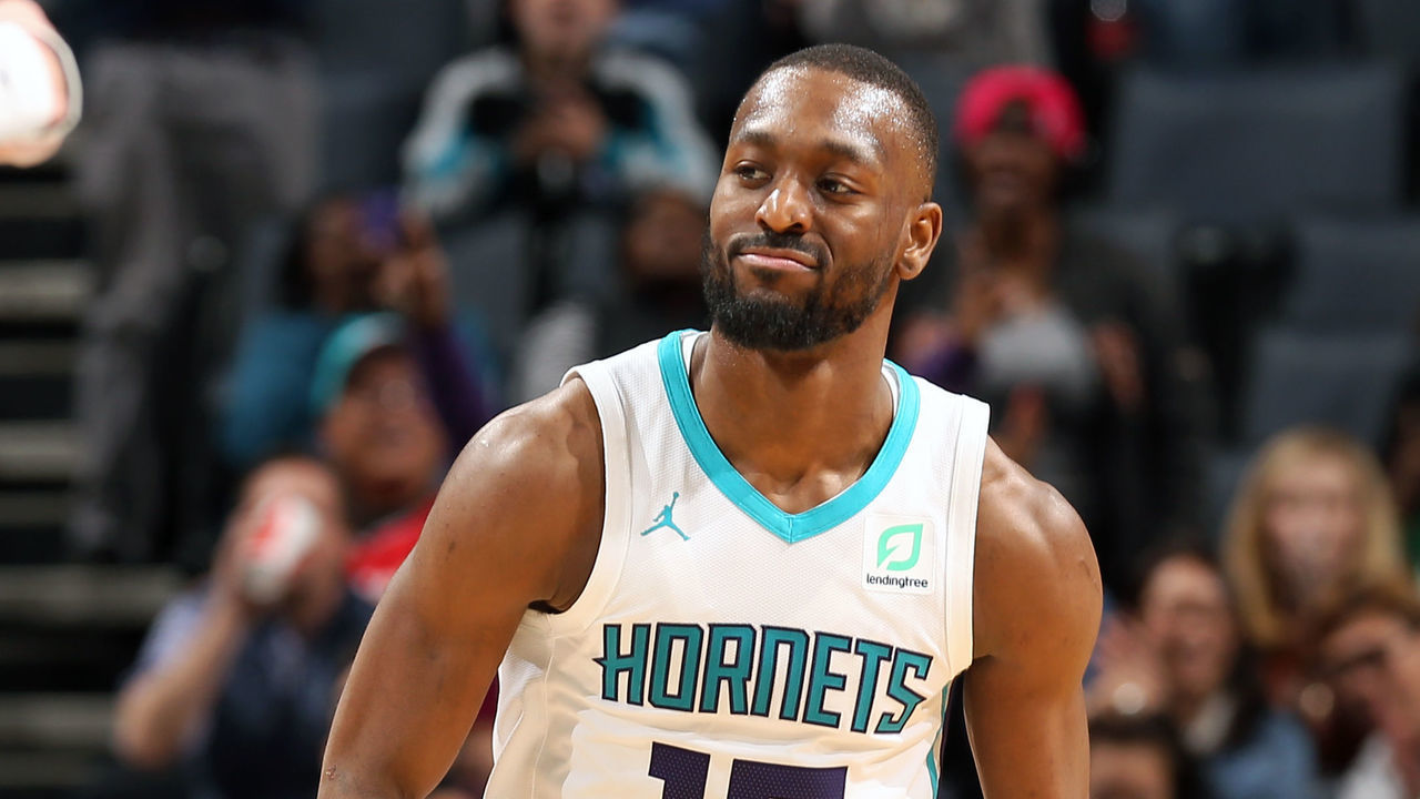 CHARLOTTE, NC - MARCH 26: Kemba Walker #15 of the Charlotte Hornets reacts to a play during the game against the San Antonio Spurs on March 26, 2019 at the Spectrum Center in Charlotte, North Carolina. NOTE TO USER: User expressly acknowledges and agrees that, by downloading and/or using this photograph, user is consenting to the terms and conditions of the Getty Images License Agreement. Mandatory Copyright Notice: Copyright 2019 NBAE