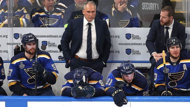 ST. LOUIS, MO - JUNE 1: The St. Louis Blues bench looks on with coach Craig Berube behind the players with seconds left in the game. The St. Louis Blues host the Boston Bruins in Game 3 of the 2019 Stanley Cup Finals at the Enterprise Center in St. Louis, MO on June 1, 2019.