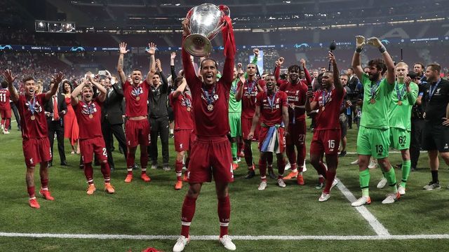 MADRID, SPAIN - JUNE 01: Virgil van Dijk of Liverpool lifts the Champions League Trophy after winning the UEFA Champions League Final between Tottenham Hotspur and Liverpool at the Wanda Metropolitano in Madrid, Spain on June 01, 2019.
