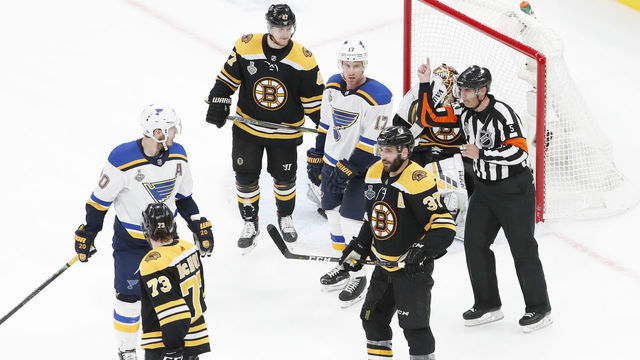 BOSTON, MA - MAY 29: St. Louis Blues left wing Jaden Schwartz (17) called for a penalty by referee Chris Rooney (5) during Game 2 of the 2019 Stanley Cup Finals between the Boston Bruins and the St. Louis Blues on May 29, 2019, at TD Garden in Boston, Massachusetts.