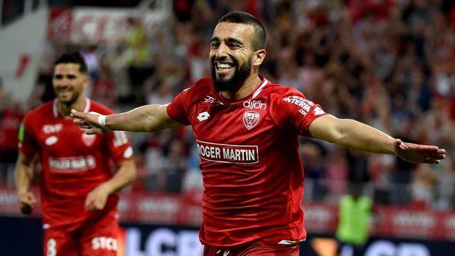 Dijon's Tunisian forward Naim Sliti celebrates after scoring a goal during the French L1-L2 second leg play-off football match between Dijon (L1) and Lens (L2), at the Gaston Gerard stadium in Dijon, central-eastern France on June 2, 2019.