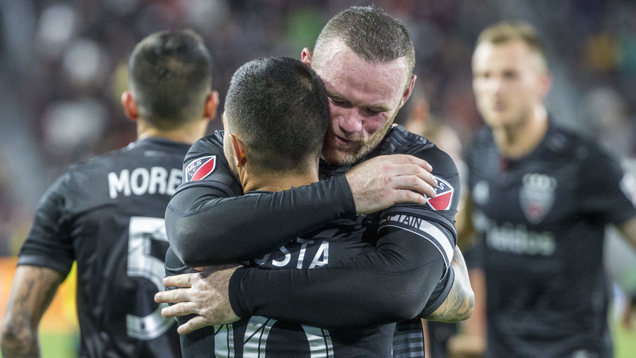 WASHINGTON, DC - MAY 29: D.C. United midfielder Luciano Acosta (10) cingratulated after scoring by forward Wayne Rooney (9) during a MLS match between D.C United and the Chicago Fire, on May 29, 2019, at Audi Field, in Washington D.C.