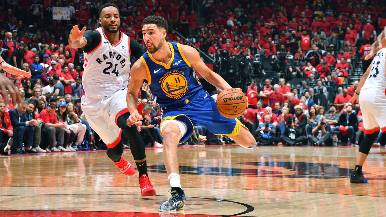 TORONTO, CANADA - JUNE 2: Klay Thompson #11 of the Golden State Warriors handles the ball against the Toronto Raptors during Game Two of the NBA Finals on June 2, 2019 at Scotiabank Arena in Toronto, Ontario, Canada. NOTE TO USER: User expressly acknowledges and agrees that, by downloading and/or using this photograph, user is consenting to the terms and conditions of the Getty Images License Agreement. Mandatory Copyright Notice: Copyright 2019 NBAE
