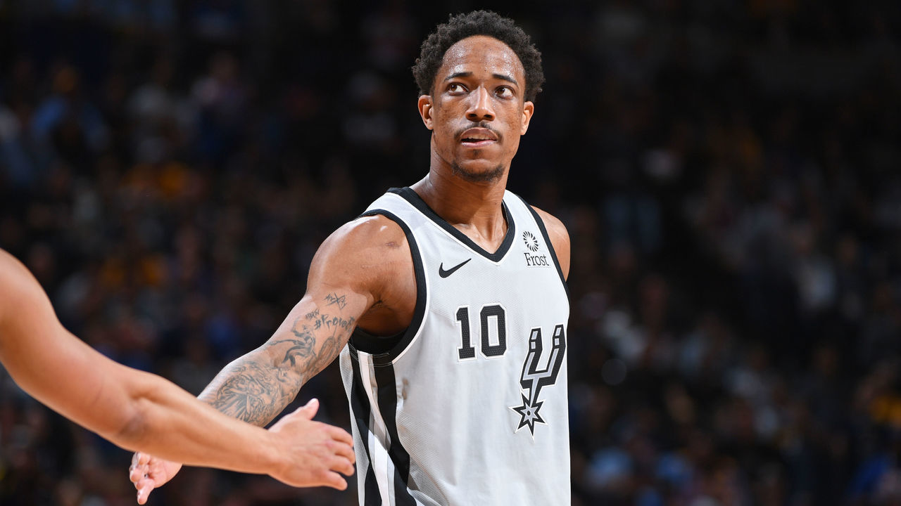 DENVER, CO - APRIL 27: DeMar DeRozan #10 of the San Antonio Spurs looks on against the Denver Nuggets during Game Seven of Round One of the 2019 NBA Playoffs on April 27, 2019 at the Pepsi Center in Denver, Colorado. NOTE TO USER: User expressly acknowledges and agrees that, by downloading and/or using this Photograph, user is consenting to the terms and conditions of the Getty Images License Agreement. Mandatory Copyright Notice: Copyright 2019 NBAE