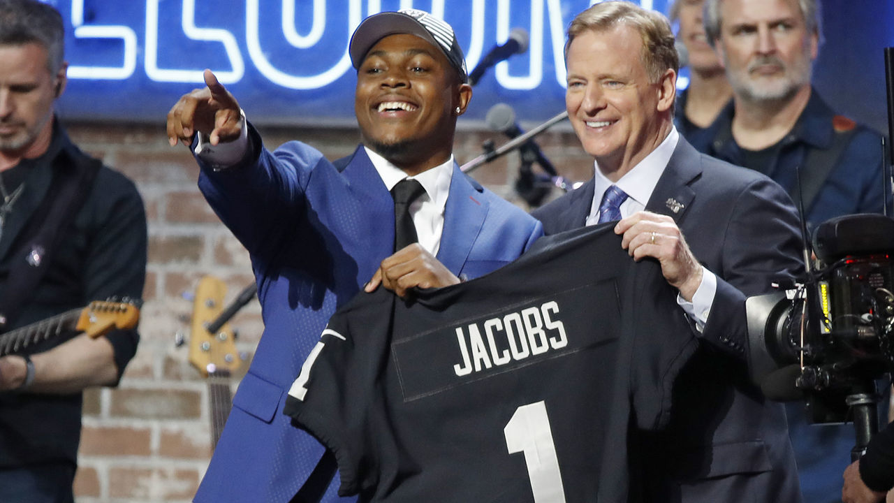 NASHVILLE, TENNESSEE - APRIL 25: Running back Josh Jacobs poses with NFL Commissioner Roger Goodell after being selected by the Oakland Raiders with pick 24 on day 1 of the 2019 NFL Draft on April 25, 2019 in Nashville, Tennessee.