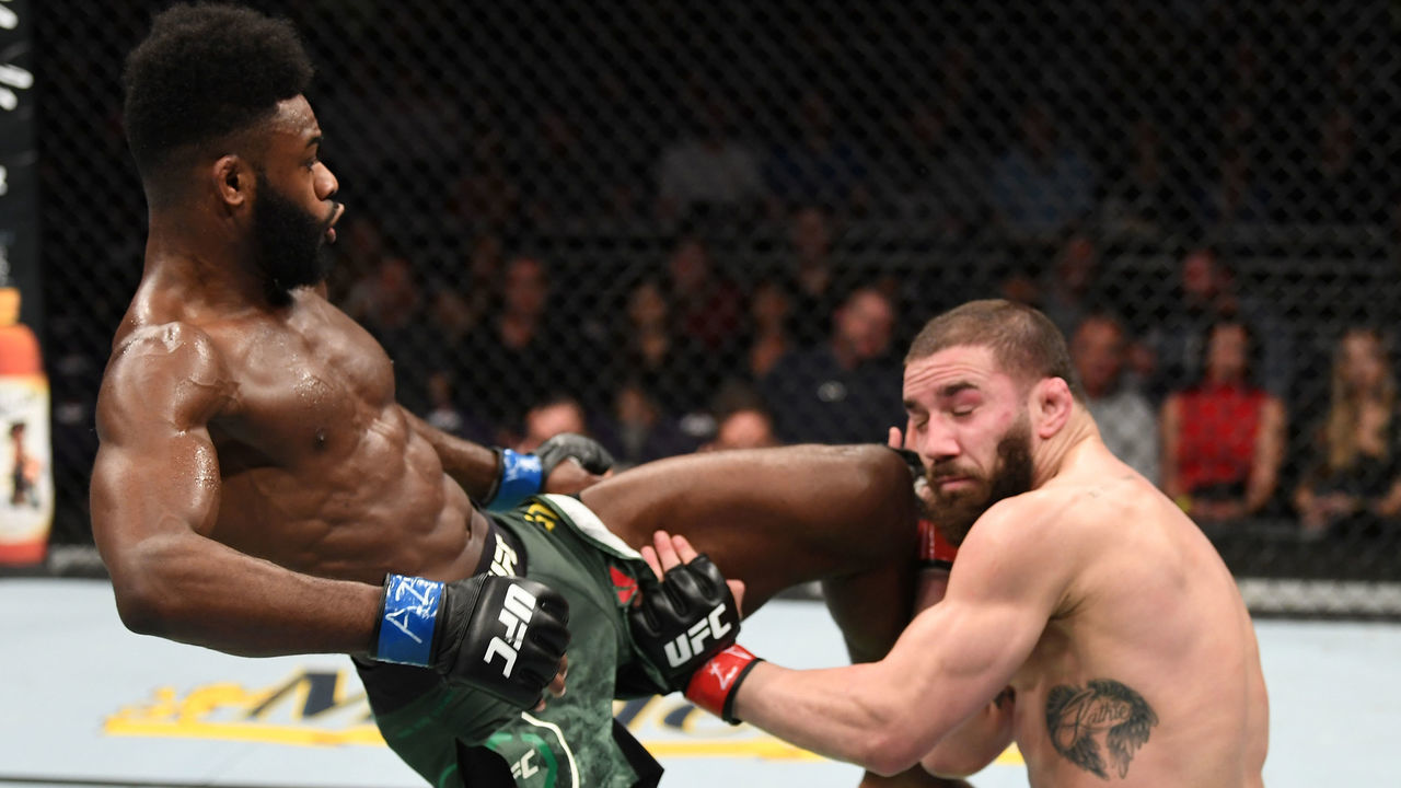 PHOENIX, ARIZONA - FEBRUARY 17: (L-R) Aljamain Sterling knees Jimmie Rivera in their bantamweight bout during the UFC Fight Night event at Talking Stick Resort Arena on February 17, 2019 in Phoenix, Arizona.