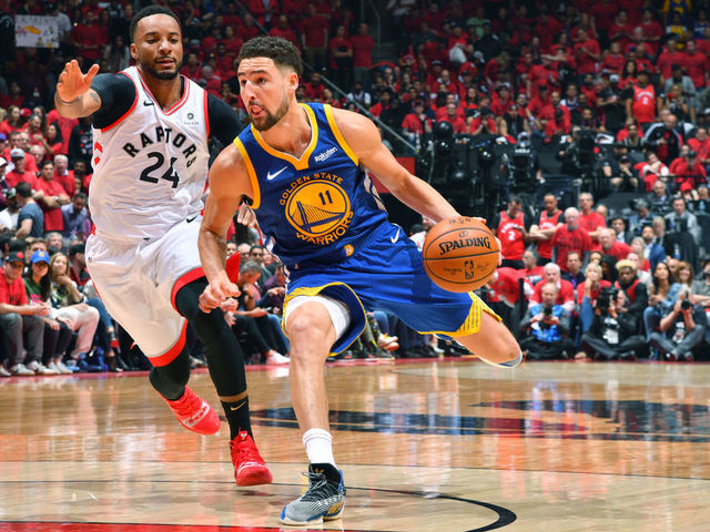 TORONTO, CANADA - JUNE 2: Klay Thompson #11 of the Golden State Warriors handles the ball against the Toronto Raptors during Game Two of the NBA Finals on June 2, 2019 at Scotiabank Arena in Toronto, Ontario, Canada. NOTE TO USER: User expressly acknowledges and agrees that, by downloading and/or using this photograph, user is consenting to the terms and conditions of the Getty Images License Agreement. Mandatory Copyright Notice: Copyright 2019 NBAE
