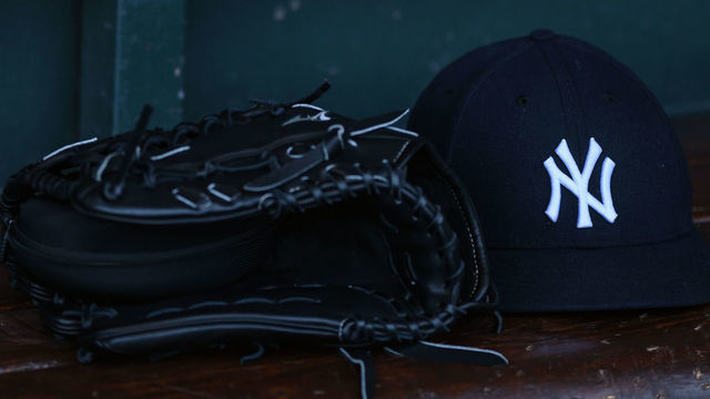 SAN FRANCISCO, CA - APRIL 26: New York Yankees ball cap and glove in the dugout before the Major League Baseball game between the New York Yankees and the San Francisco Giants at Oracle Park on April 26, 2019 in San Francisco, CA.