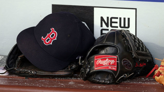 PHILADELPHIA, PA - AUGUST 14: A Rawlings leather baseball glove and a hat sit on the bench in the dugout before a game between the Boston Red Sox and the Philadelphia Phillies at Citizens Bank Park on August 14, 2018 in Philadelphia, Pennsylvania. The Red Sox won 2-1.