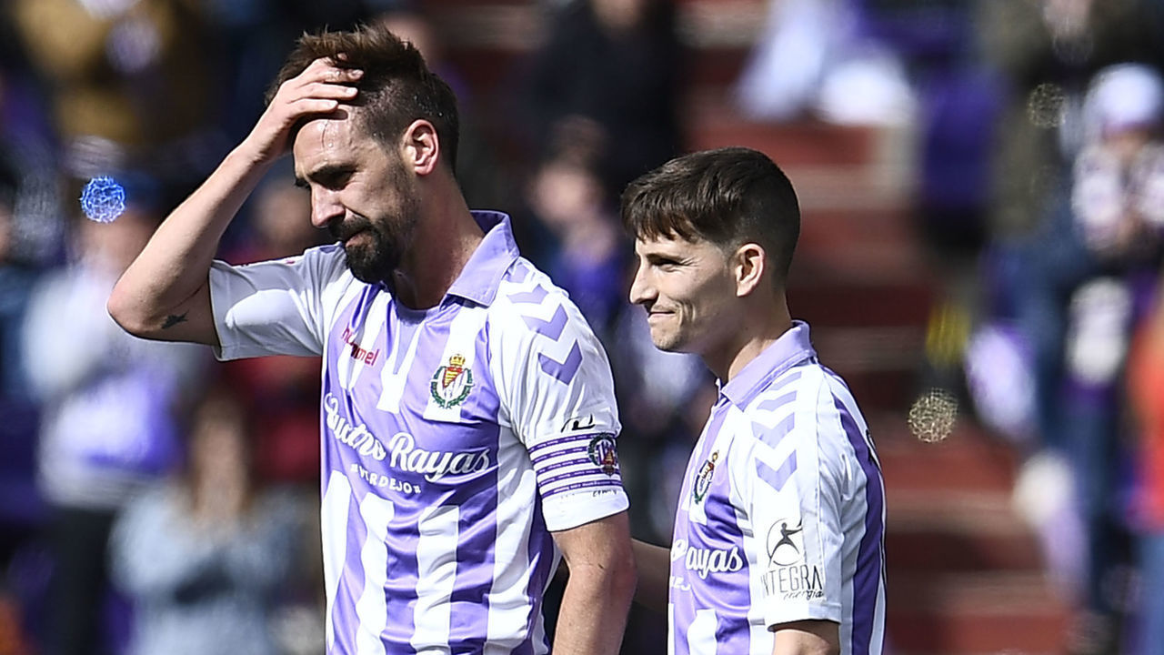 Real Valladolid's Spanish midfielder Borja Fernandez (L) gestures during the Spanish league football match between Real Valladolid FC and Valencia CF at the Jose Zorrilla stadium in Valladolid on May 18, 2019. - Spanish police were carrying out an operation today against several footballers --among them Spanish player Borja Fernandez-- ex-players and club managers accused of fixing matches in the first and second divisions, a source close to the probe said.