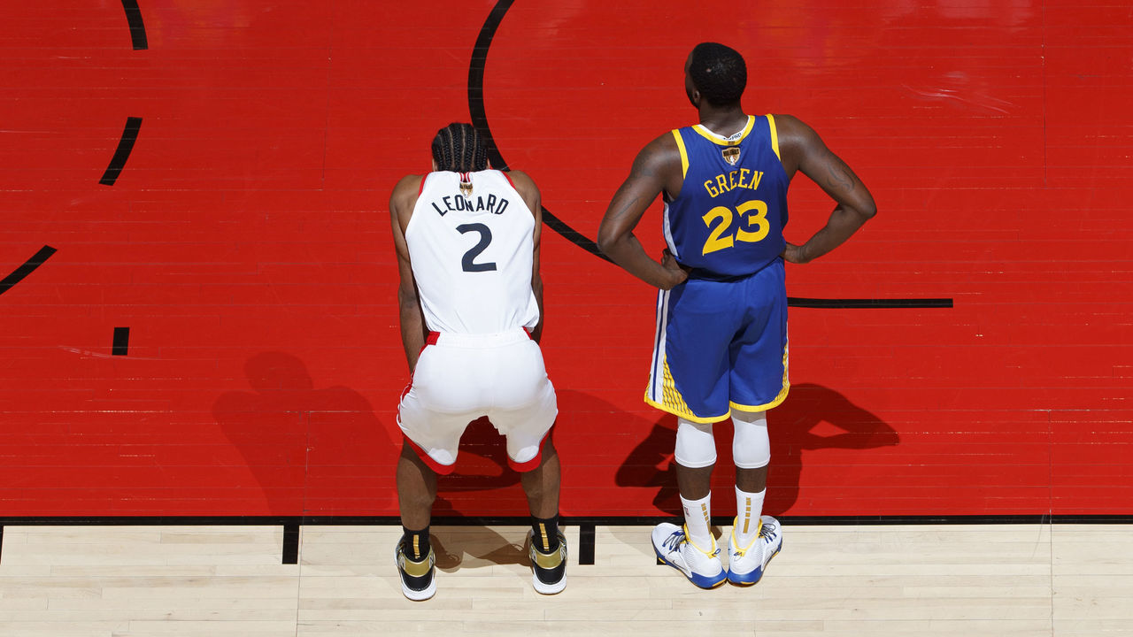 TORONTO, CANADA - JUNE 02: Kawhi Leonard #2 of the Toronto Raptors and Draymond Green #23 of the Golden State Warriors stand on the court during Game Two of the NBA Finals on June 2, 2019 at Scotiabank Arena in Toronto, Ontario, Canada. NOTE TO USER: User expressly acknowledges and agrees that, by downloading and/or using this photograph, user is consenting to the terms and conditions of the Getty Images License Agreement. Mandatory Copyright Notice: Copyright 2019 NBAE