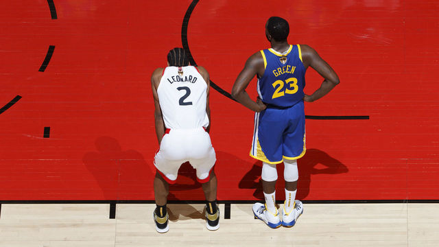TORONTO, CANADA - JUNE 02: Kawhi Leonard #2 of the Toronto Raptors and Draymond Green #23 of the Golden State Warriors stand on the court during Game Two of the NBA Finals on June 2, 2019 at Scotiabank Arena in Toronto, Ontario, Canada. NOTE TO USER: User expressly acknowledges and agrees that, by downloading and/or using this photograph, user is consenting to the terms and conditions of the Getty Images License Agreement. Mandatory Copyright Notice: Copyright 2019 NBAE