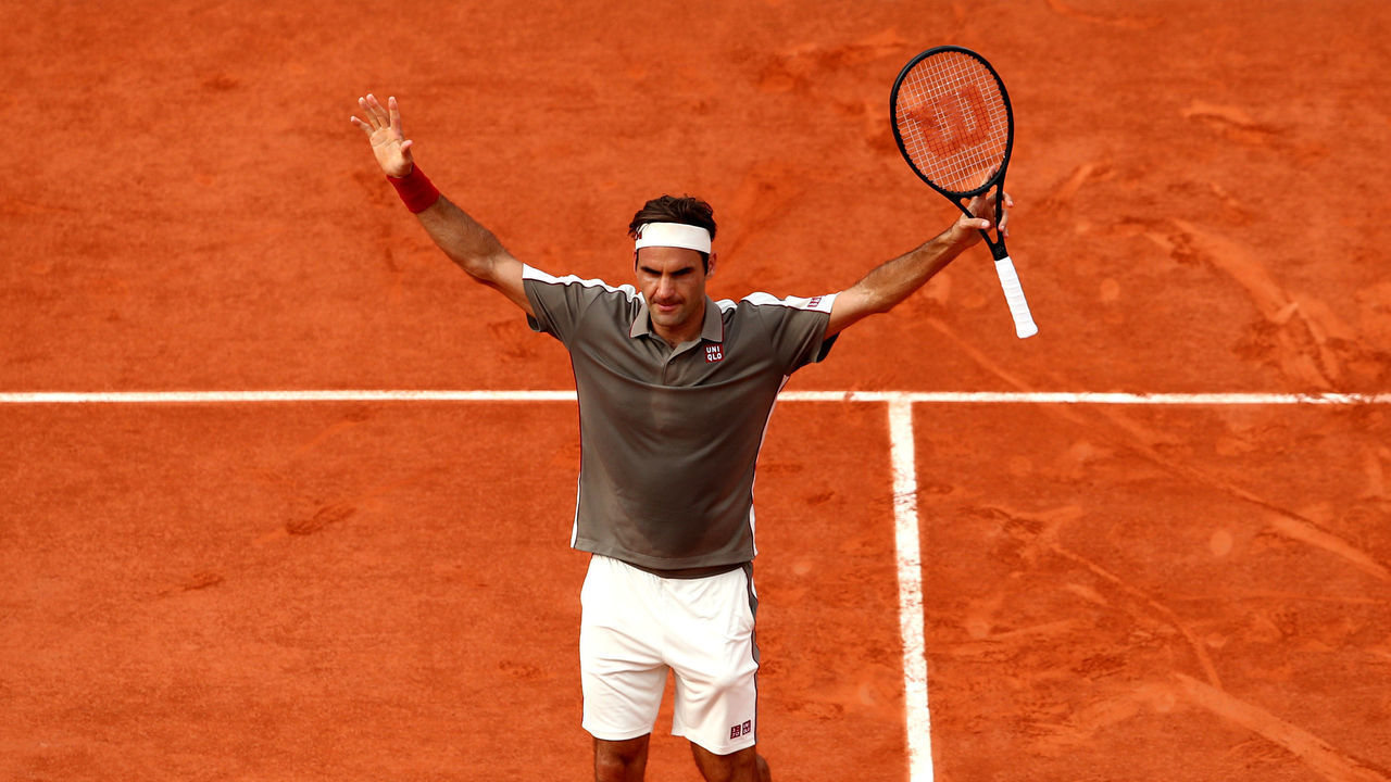 PARIS, FRANCE - JUNE 04: Roger Federer of Switzerland celebrates victory during his mens singles quarter-final match against Stan Wawrinka of Switzerland during Day ten of the 2019 French Open at Roland Garros on June 04, 2019 in Paris, France.