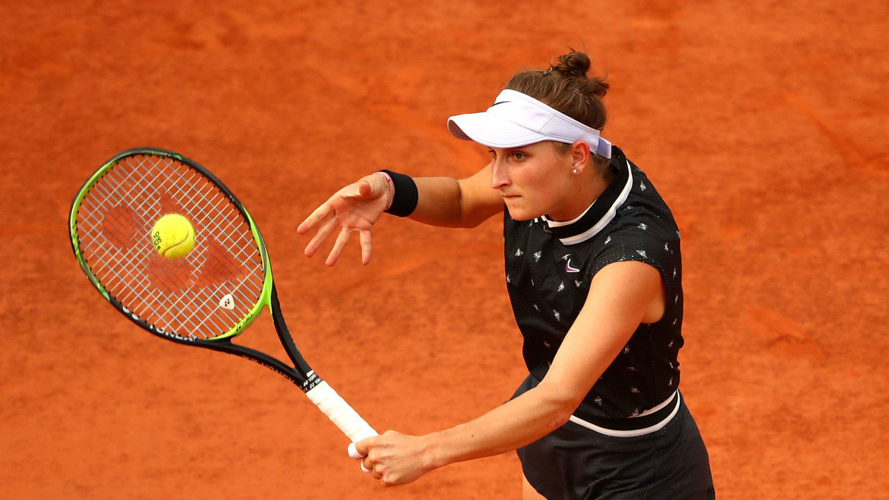 PARIS, FRANCE - JUNE 04: Marketa Vondrousova of The Czech Republic plays a backhand during her ladies singles quarter-final match against Petra Martic of Croatia during Day ten of the 2019 French Open at Roland Garros on June 04, 2019 in Paris, France.