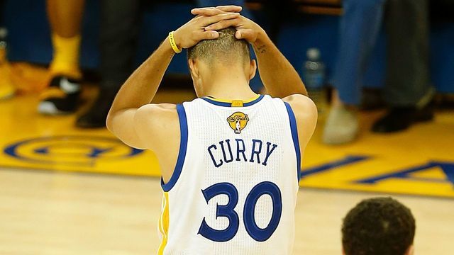 Golden State Warriors guard Stephen Curry reacts after being called for a foul during the second quarter in Game 7 of the NBA Finals against the Cleveland Cavaliers on June 19, 2016 in Oakland, California. Powered by an amazing effort from LeBron James, the Cleveland Cavaliers completed the greatest comeback in NBA Finals history, dethroning defending champion Golden State 93-89 to capture their first NBA title. The Cavaliers won the best-of-seven series 4-3 to claim the first league crown in their 46-season history and deliver the first major sports champion to Cleveland since the 1964 NFL Browns, ending the longest such title drought for any American city. / AFP / Beck Diefenbach