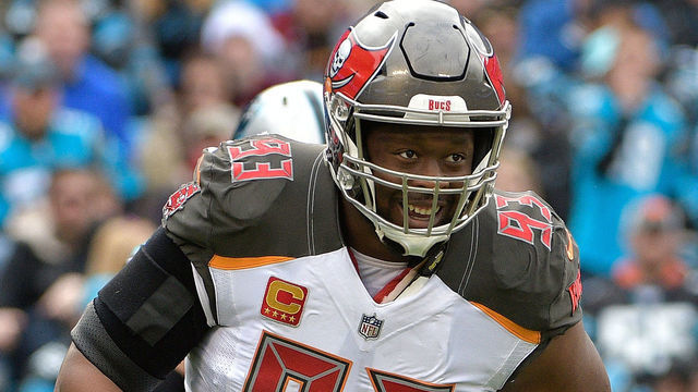 CHARLOTTE, NC - DECEMBER 24: Gerald McCoy #93 of the Tampa Bay Buccaneers reacts after sacking Cam Newton #1 of the Carolina Panthers during their game at Bank of America Stadium on December 24, 2017 in Charlotte, North Carolina.
