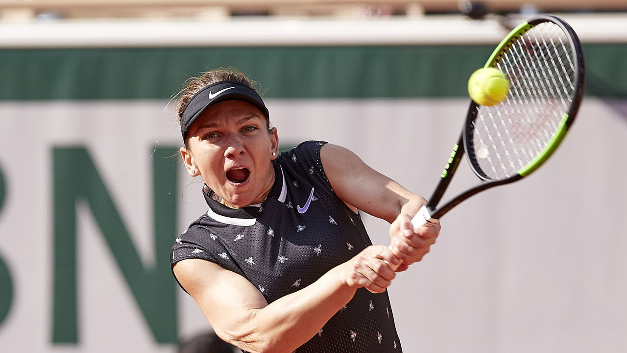 PARIS, FRANCE - JUNE 03: Simona Halep of Romania returns the ball in her ladies singles third round match against Lesia Tsurenko of Ukraine during Day seven of the 2019 French Open at Roland Garros on June 01, 2019 in Paris, France.