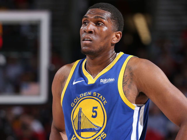 PORTLAND, OR - MAY 20: Kevon Looney #5 of the Golden State Warriors looks on during Game Four of the Western Conference Finals against the Portland Trail Blazers on May 20, 2019 at the Moda Center in Portland, Oregon. NOTE TO USER: User expressly acknowledges and agrees that, by downloading and/or using this photograph, user is consenting to the terms and conditions of the Getty Images License Agreement. Mandatory Copyright Notice: Copyright 2019 NBAE