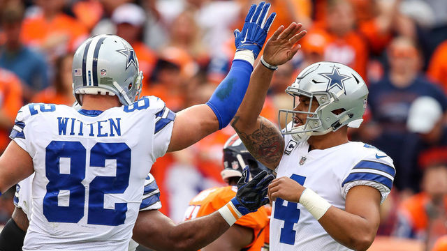 DENVER, CO - SEPTEMBER 17: Quarterback Dak Prescott #4 of the Dallas Cowboys celebrates with Jason Witten after throwing for a second quarter touchdown at Sports Authority Field at Mile High on September 17, 2017 in Denver, Colorado.