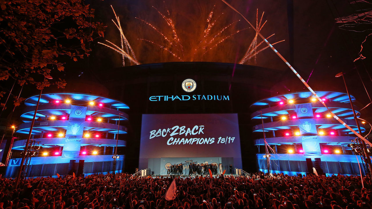 MANCHESTER, ENGLAND - MAY 12: A general view outside the stadium as the players of Manchester City celebrate in front of their fans with the trophy after winning the Premier League title at the Etihad Stadium on May 12, 2019 in Manchester, England.