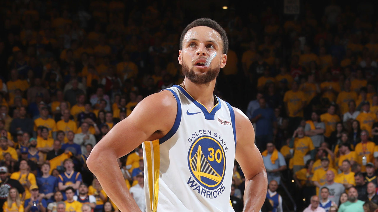 OAKLAND, CA - JUNE 5: Stephen Curry #30 of the Golden State Warriors looks on during Game Three of the NBA Finals against the Toronto Raptors on June 5, 2019 at ORACLE Arena in Oakland, California. NOTE TO USER: User expressly acknowledges and agrees that, by downloading and/or using this photograph, user is consenting to the terms and conditions of Getty Images License Agreement. Mandatory Copyright Notice: Copyright 2019 NBAE