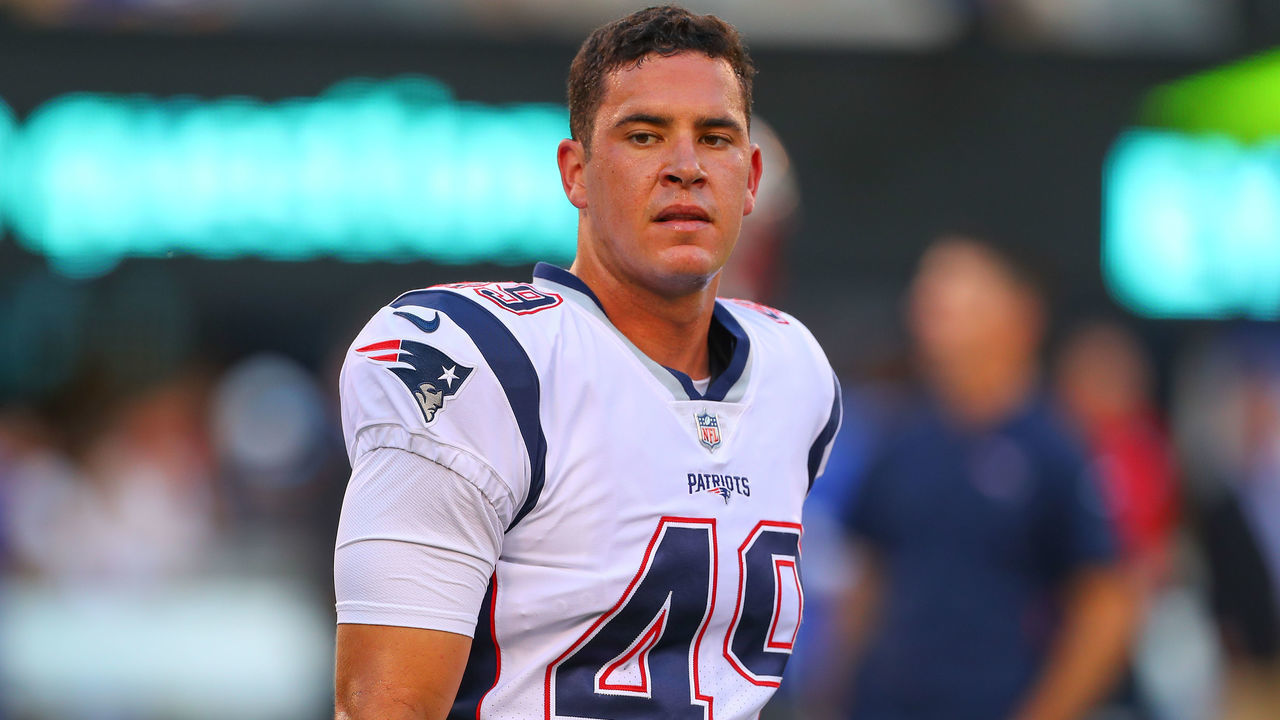 EAST RUTHERFORD, NJ - AUGUST 30: New England Patriots long snapper Joe Cardona (49) warms up prior to the National Football League game between the New York Giants and the New England Patriots on August 30, 2018 at MetLife Stadium in East Rutherford, NJ.